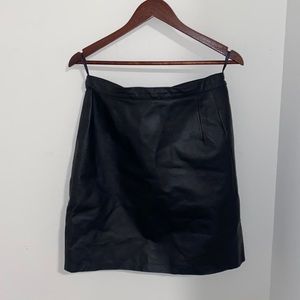 Leather mini skirt.